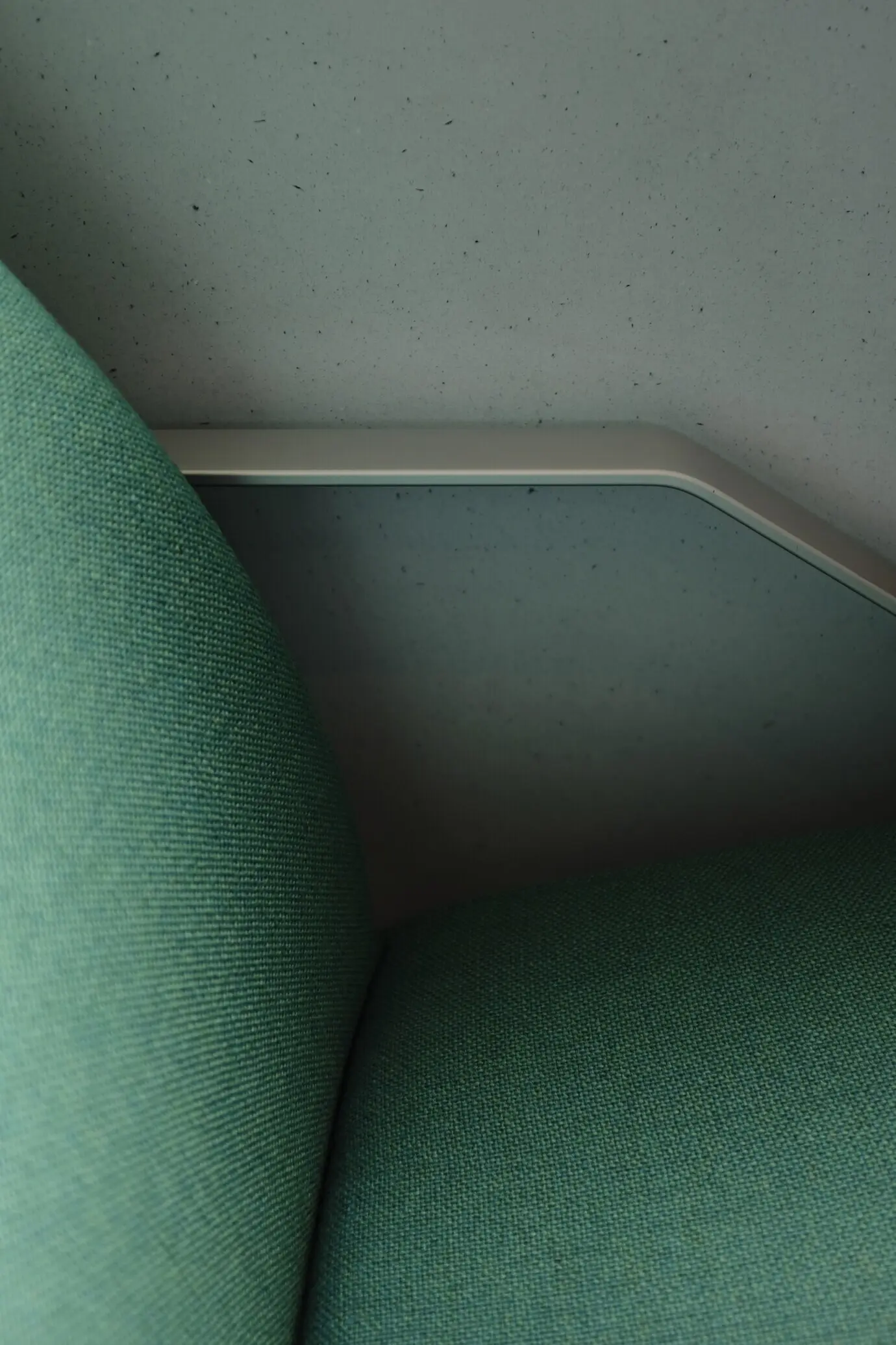 One side of a green chair