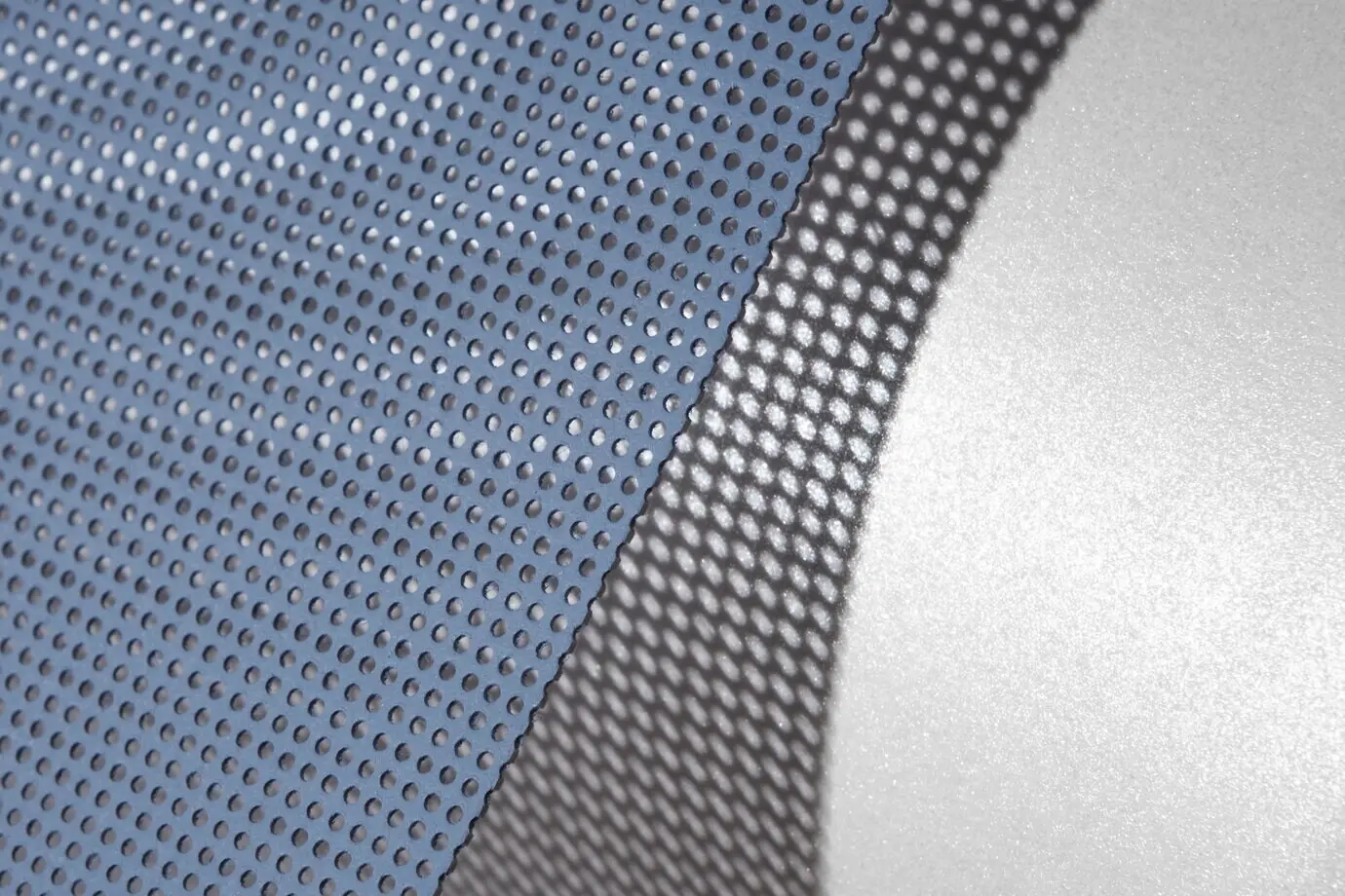 Top view of a still life of microperforated sheets.